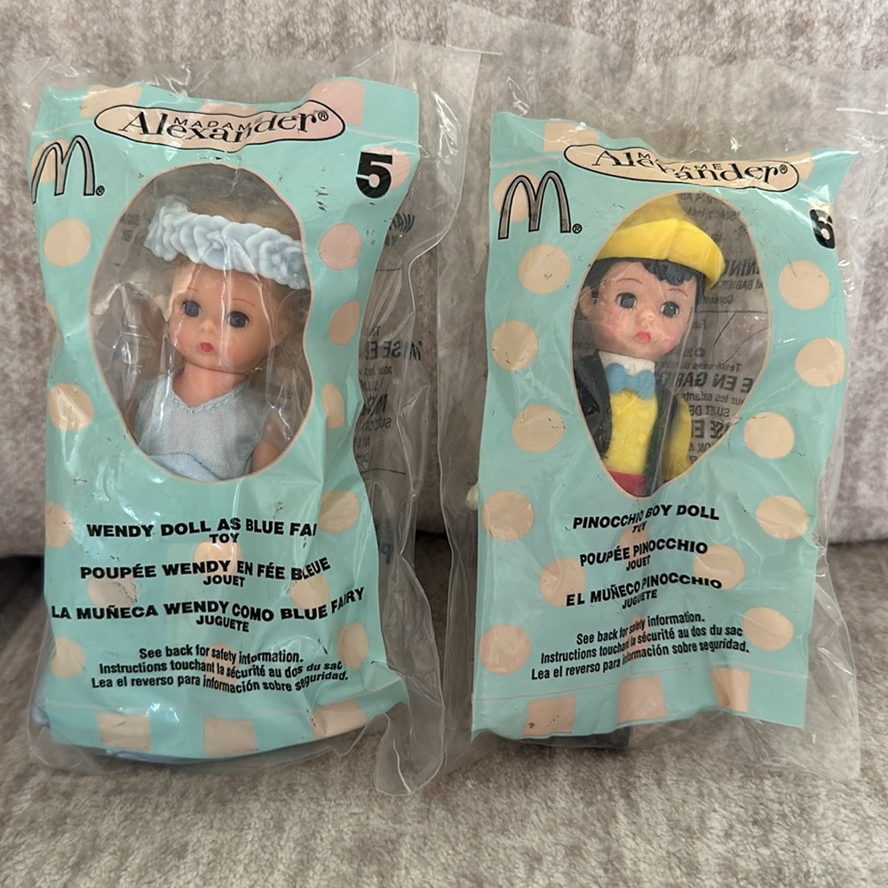 Madame Alexander McDonald’s happy meal toys. the blue fairy and Pinocchio.